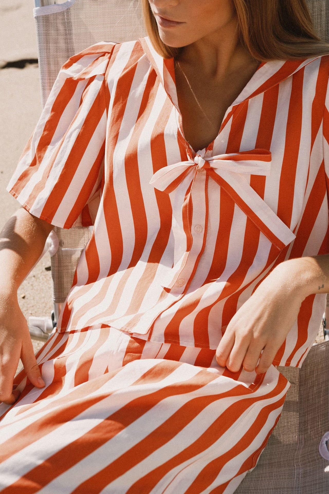 Blouse à rayures orange et blanche