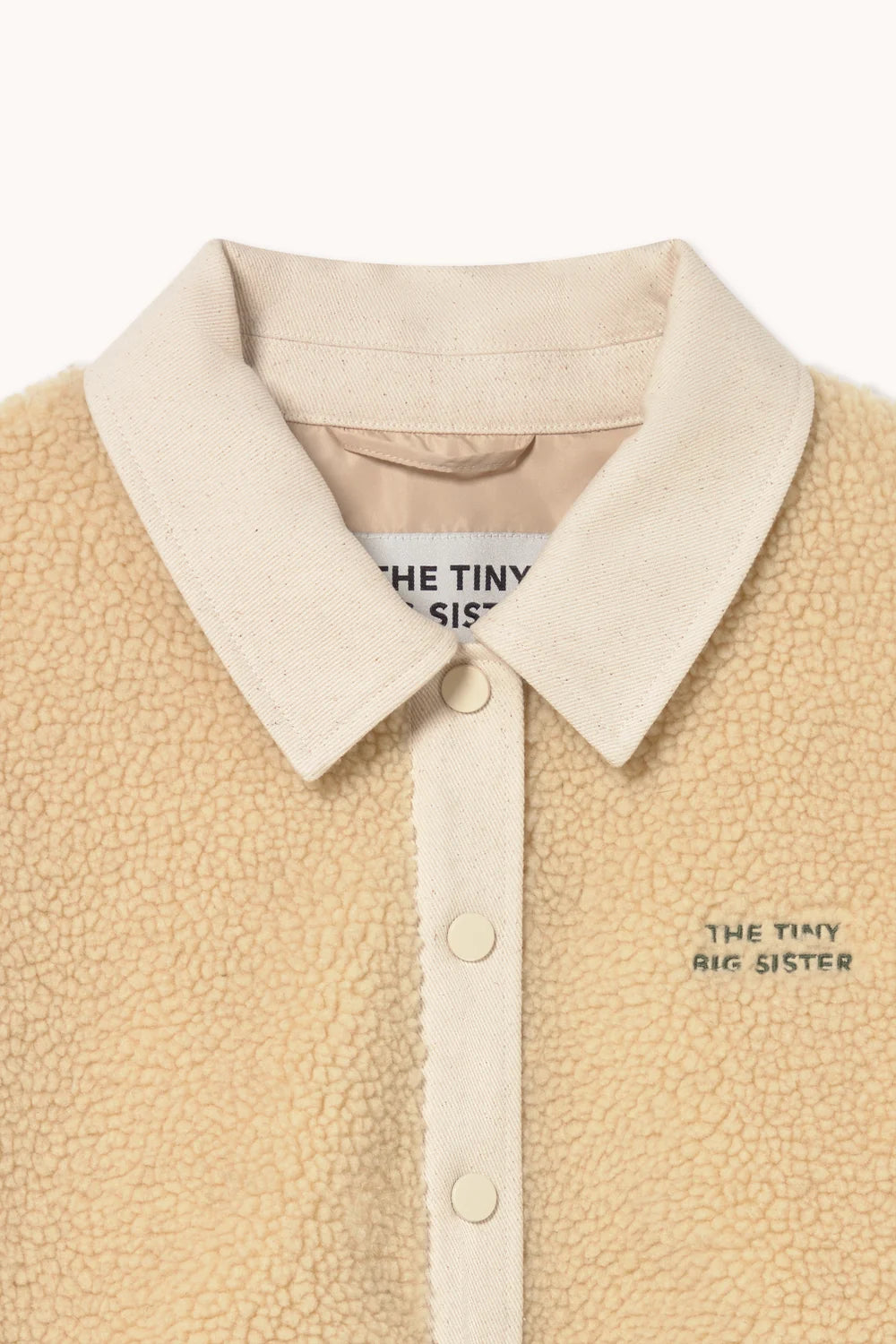 Veste en sherpa verte et crème