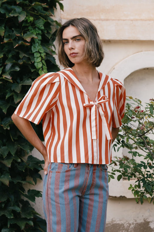 Blouse à rayures orange et blanche