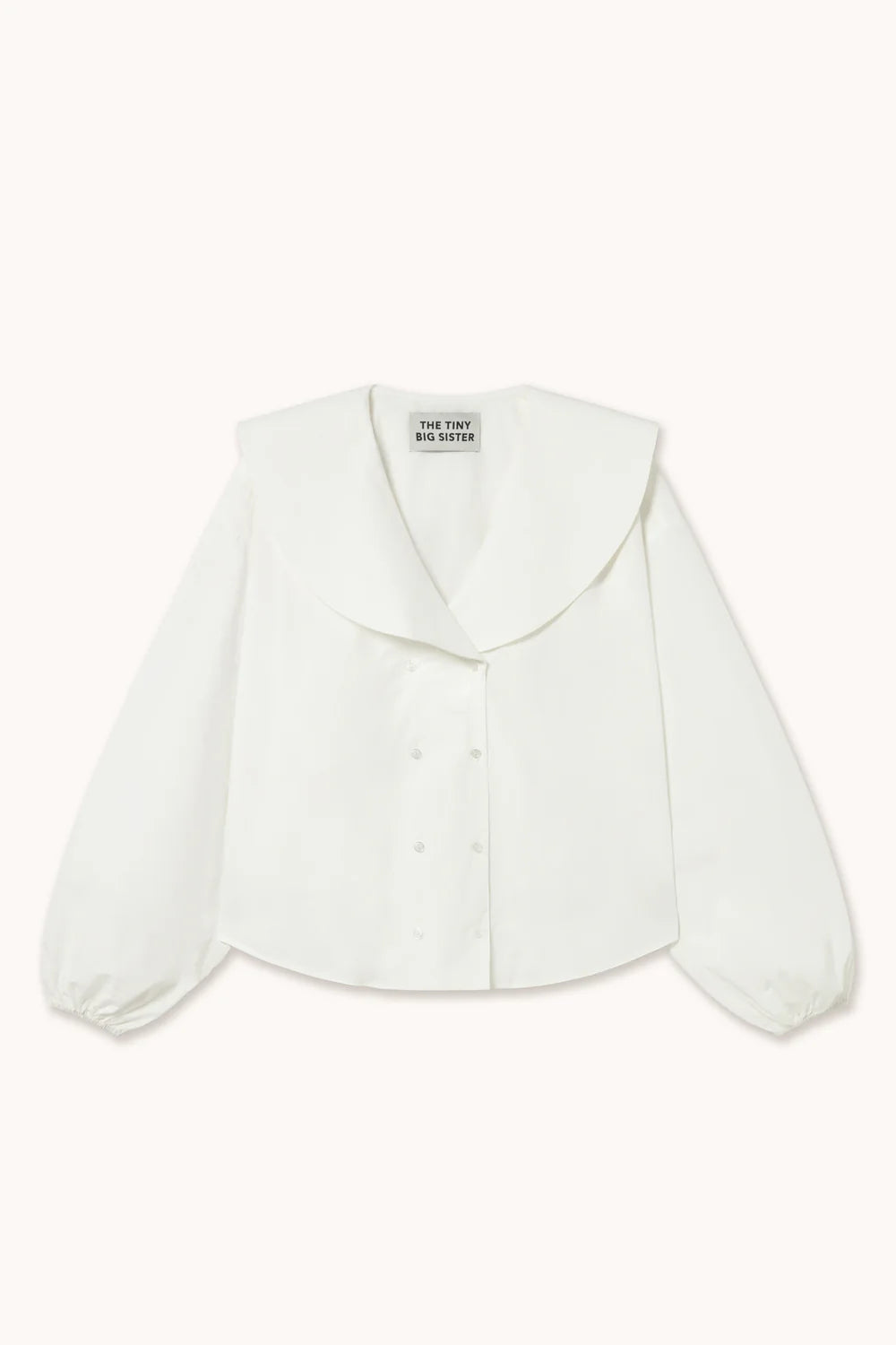 Blouse blanche avec doubles boutons