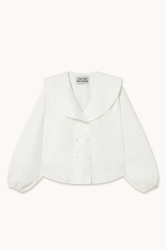 Blouse blanche avec doubles boutons