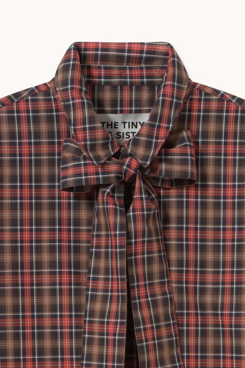 Robe à carreaux rouge et marron