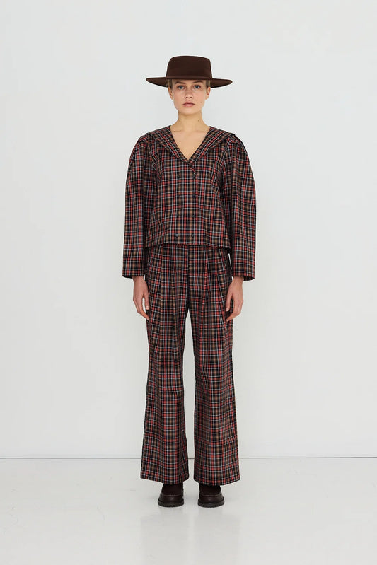 Blouse à carreaux rouge et marron