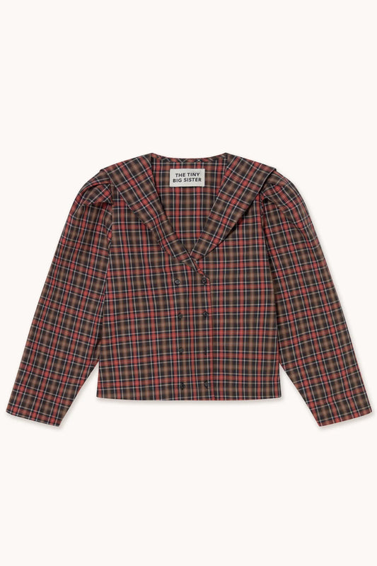 Blouse à carreaux rouge et marron